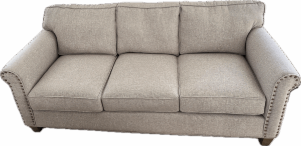 Beige Sofa with Bronze Nailheads