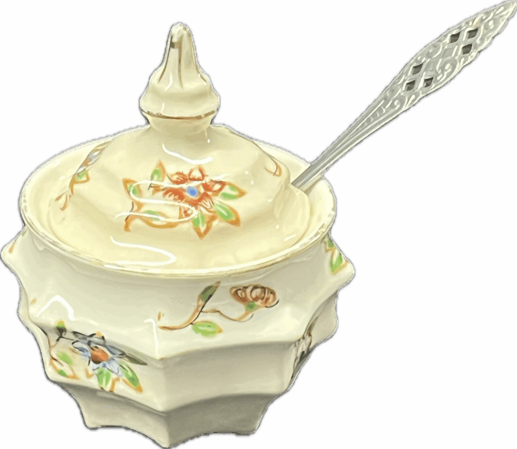 Floral Cruet with Ornate Silver Spoon