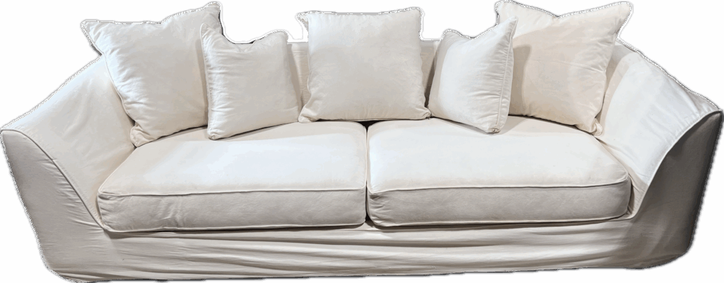 White Slipcovered Sofa with Matching Pillows
