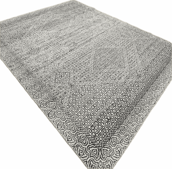 White and Black Patterned Rug