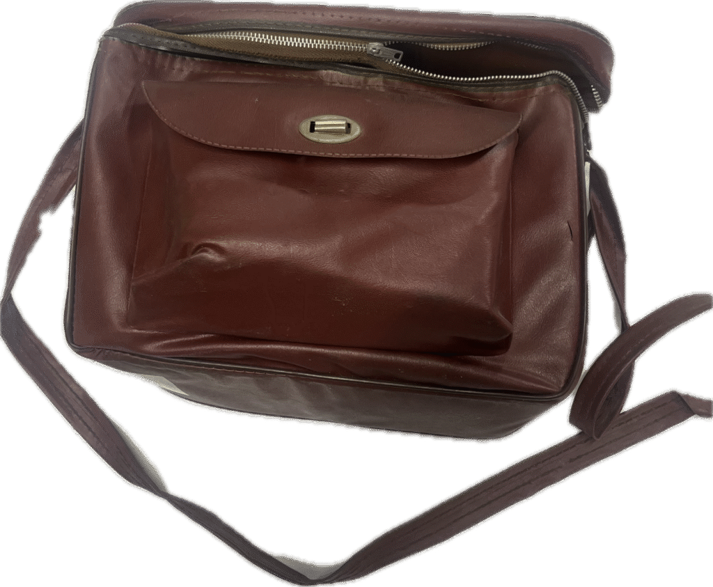 Belle and Howell 134 Movie Camera with Bulbs and Plum Bag