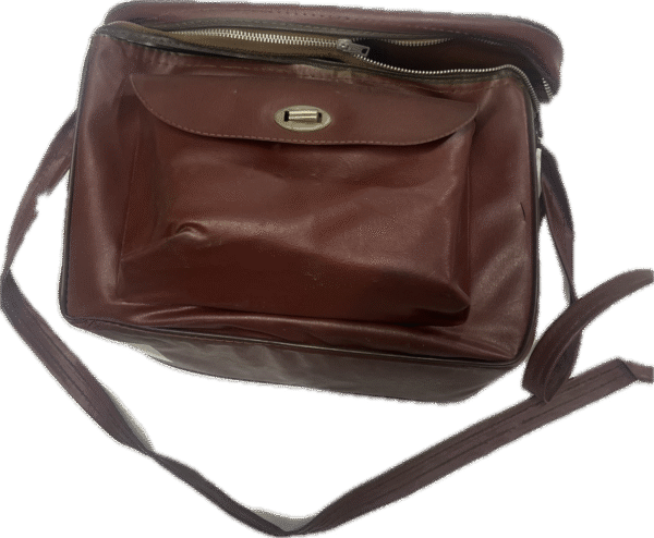 Belle and Howell 134 Movie Camera with Bulbs and Plum Bag